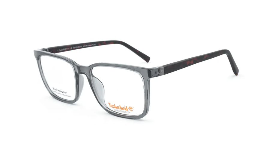 Timberland eyeglasses with a translucent smoky gray acetate frame and dark tortoiseshell temples, shown on a white background.