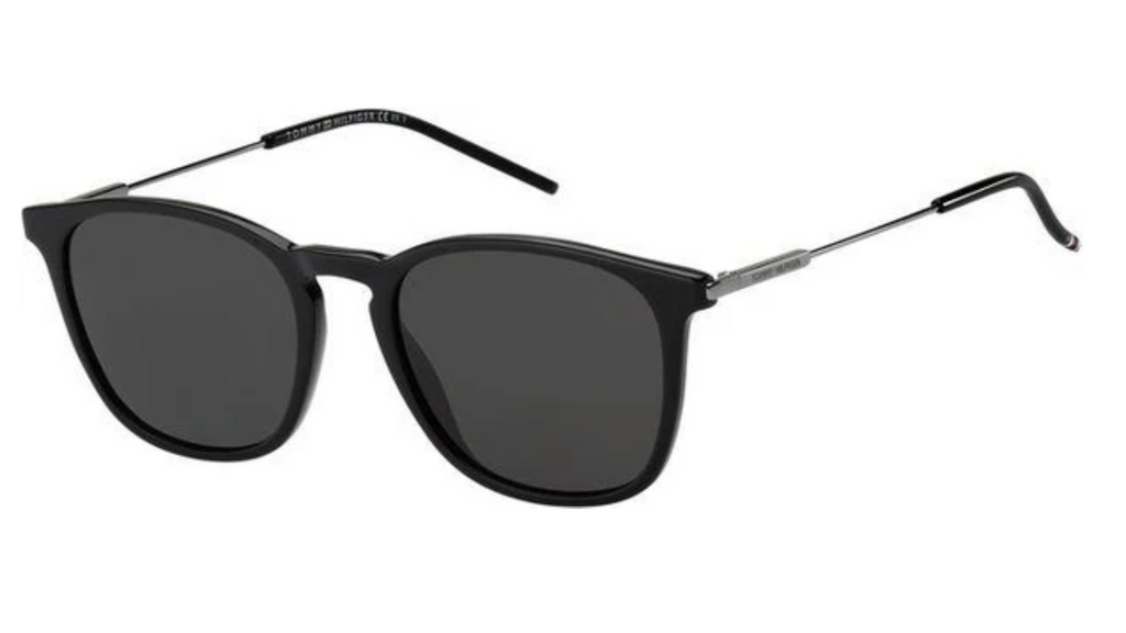 Black sunglasses with dark lenses and thin silver metal temples, shown on a plain white background.