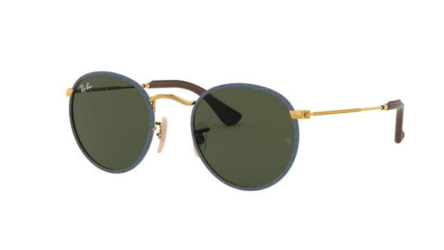 Round sunglasses with gold metal frames and dark green lenses, shown from a side angle on a plain white background.